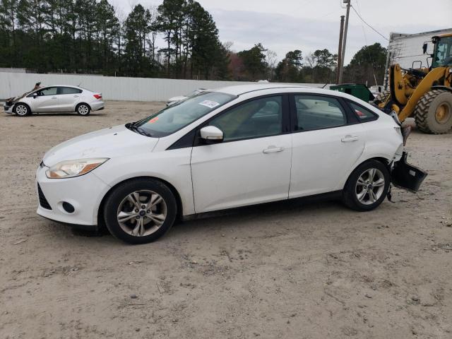FORD FOCUS SE 2014 with VIN 1FADP3F26EL353815 - Photo from auction