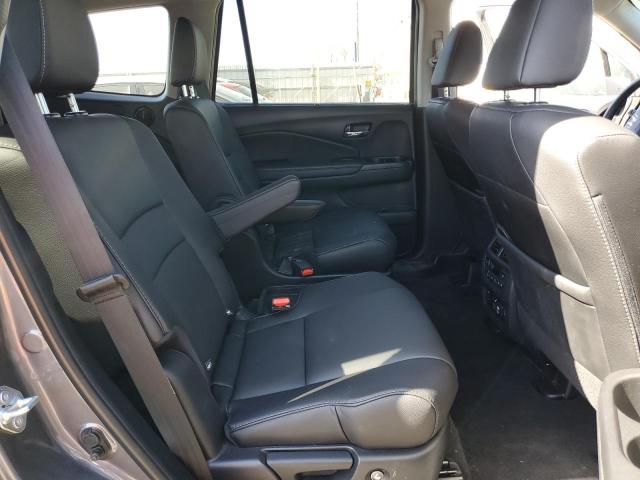 Photo 11 from auction – 2022 HONDA PILOT TOUR with VIN 5FNYF6H63NB003979