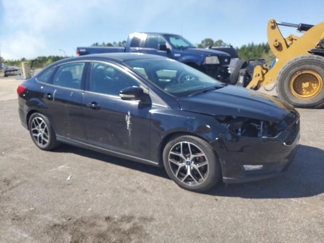 Photo 4 from auction – 2017 FORD FOCUS SEL with VIN 1FADP3H26HL256258