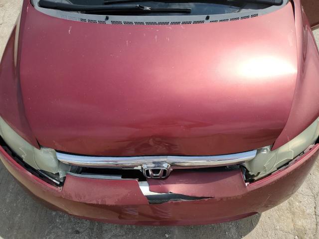 Photo 11 from auction – 2006 HONDA CIVIC LX with VIN 1HGFA16556L130414