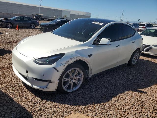 TESLA MODEL Y 2023 with VIN 7SAYGAEE1PF770201 - Photo from auction