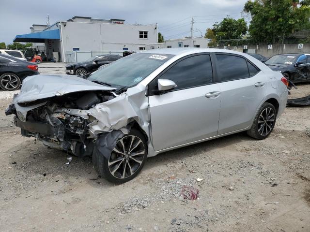 TOYOTA COROLLA L 2017 with VIN 5YFBURHE8HP650696 - Photo from auction