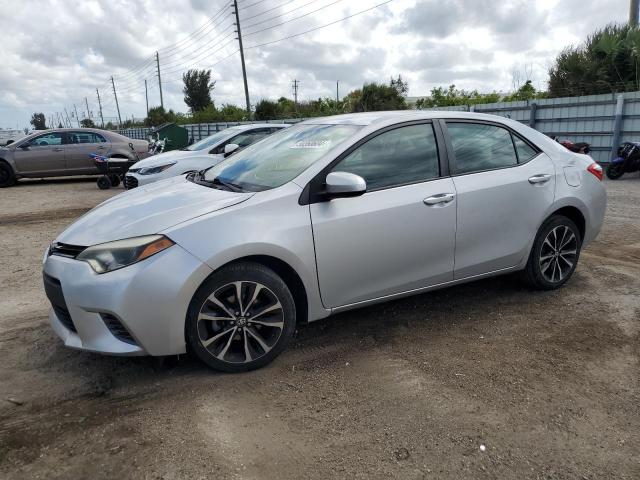 TOYOTA COROLLA L 2015 with VIN 5YFBURHE2FP268256 - Photo from auction