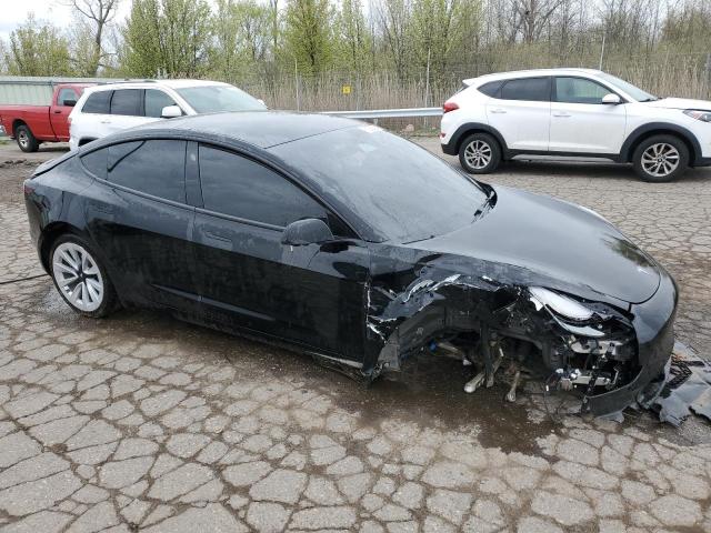 Photo 4 from auction – 2022 TESLA MODEL 3 with VIN 5YJ3E1EB4NF288192