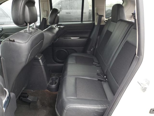 Photo 11 from auction – 2014 JEEP COMPASS SP with VIN 1C4NJDAB9ED835086