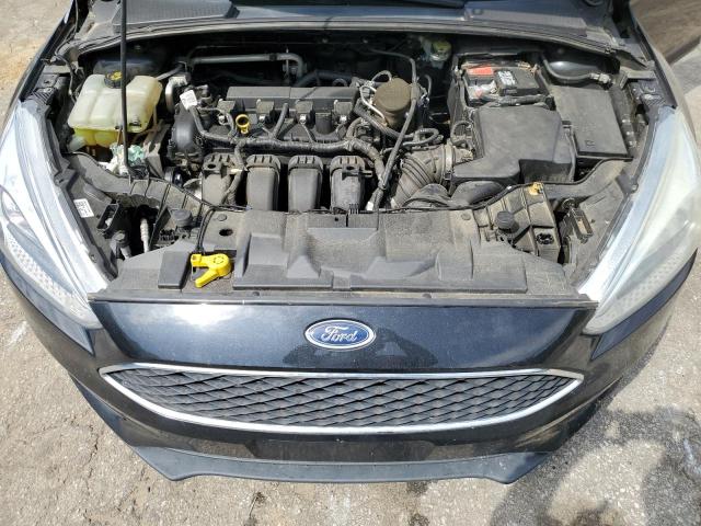 Photo 11 from auction – 2015 FORD FOCUS SE with VIN 1FADP3K23FL365489