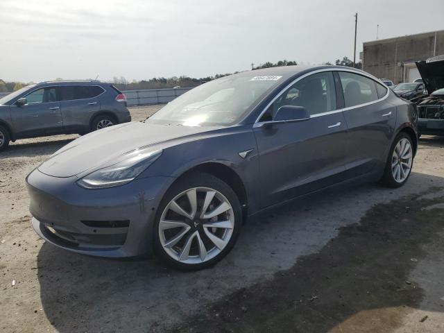 TESLA MODEL 3 2018 with VIN 5YJ3E1EA6JF049017 - Photo from auction