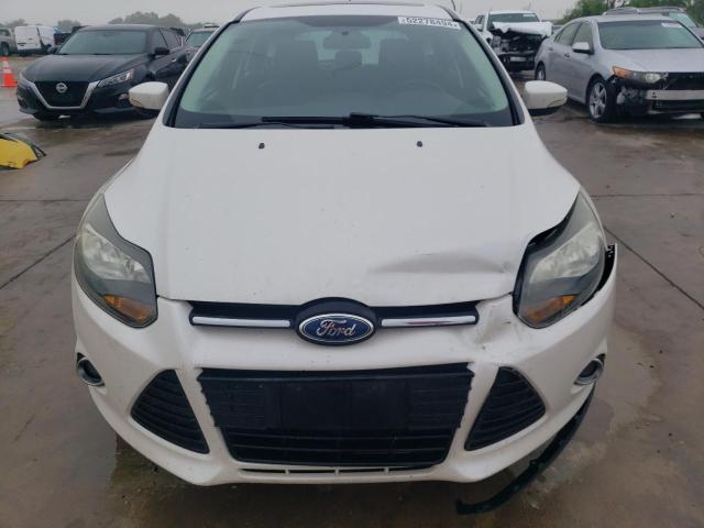 Photo 5 from auction – 2014 FORD FOCUS TITA with VIN 1FADP3N23EL128043