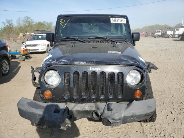 Photo 5 from auction – 2013 JEEP WRANGLER U with VIN 1C4BJWDG2DL691052