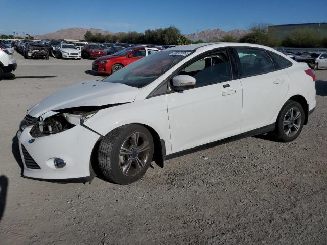FORD FOCUS SE 2014 with VIN 1FADP3F20EL126538 - Photo from auction