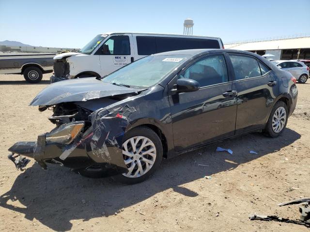 TOYOTA COROLLA L 2017 with VIN 5YFBURHE1HP648062 - Photo from auction