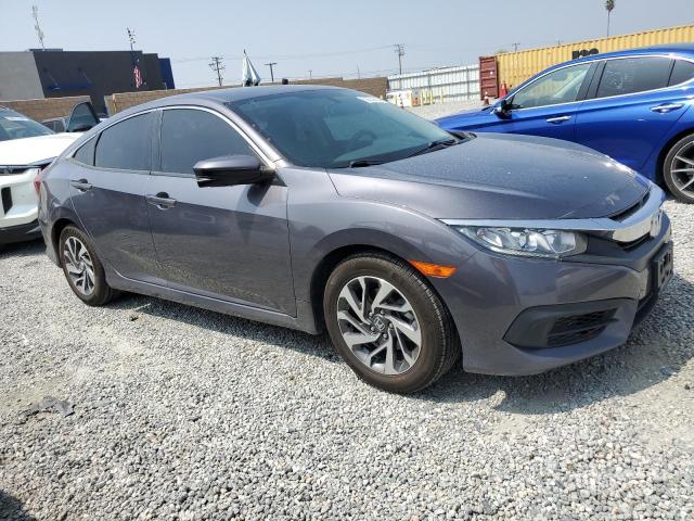 Photo 4 from auction – 2018 HONDA CIVIC EX with VIN 19XFC2F75JE209177