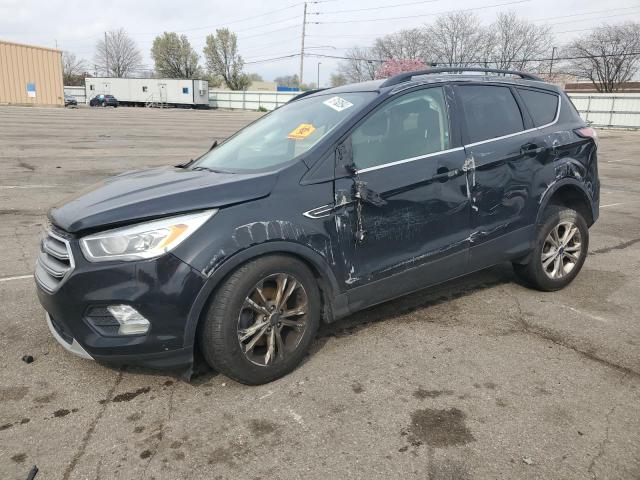 FORD ESCAPE SE 2017 with VIN 1FMCU0GDXHUD38337 - Photo from auction