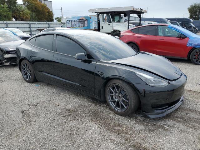 Photo 4 from auction – 2023 TESLA MODEL 3 with VIN 5YJ3E1EA2PF495769
