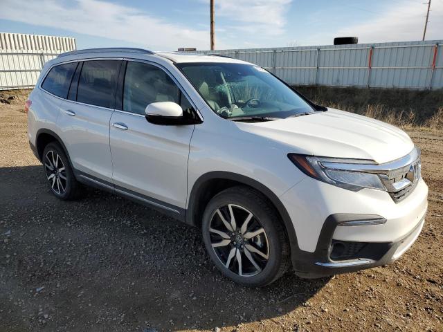 Photo 4 from auction – 2022 HONDA PILOT TOUR with VIN 5FNYF6H65NB085472