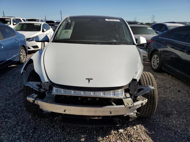Photo 5 from auction – 2022 TESLA MODEL Y with VIN 7SAYGDEE1NF315010