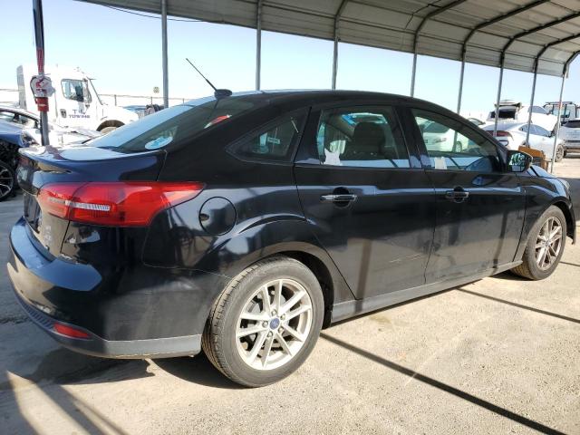 Photo 3 from auction – 2016 FORD FOCUS SE with VIN 1FADP3F29GL286579