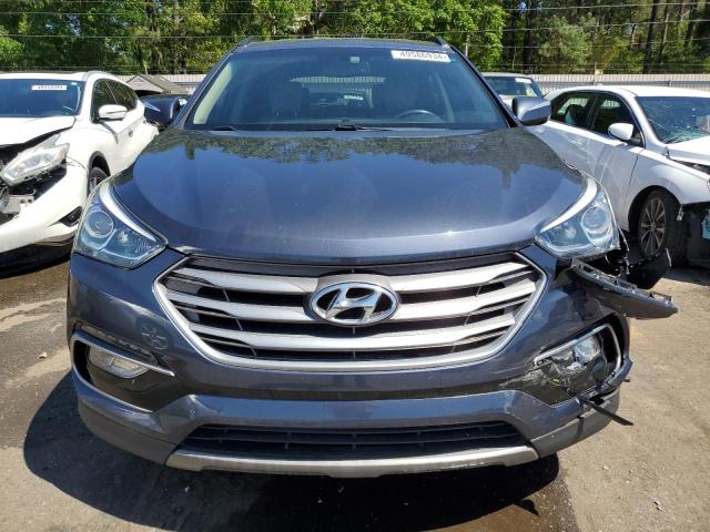 Photo 5 from auction – 2017 HYUNDAI SANTA FE S with VIN 5NMZU3LB0HH007942