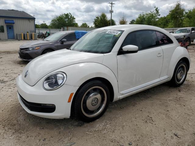 VOLKSWAGEN BEETLE 2012 with VIN 3VWJP7AT4CM617708 - Photo from auction