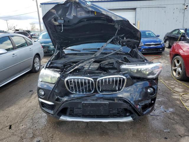 Photo 5 from auction – 2018 BMW X1 SDRIVE2 with VIN WBXHU7C33J5L09474