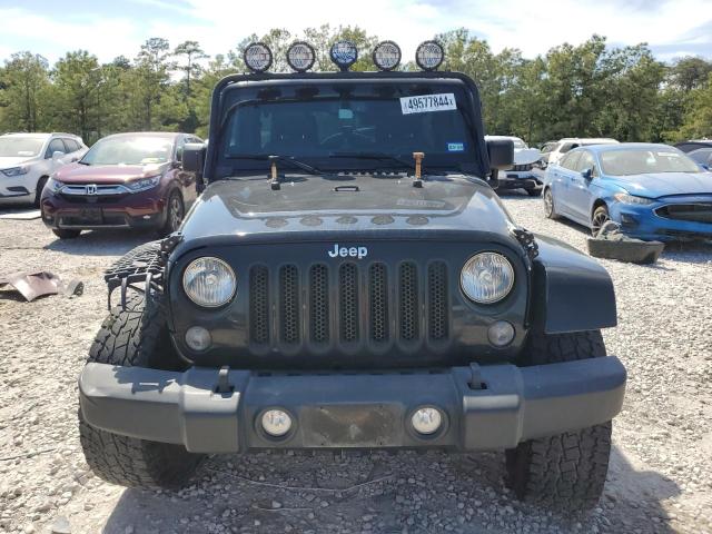 Photo 5 from auction – 2014 JEEP WRANGLER U with VIN 1C4HJWFG3EL201842