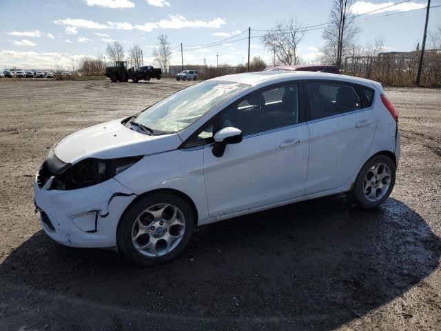 FORD FIESTA SES 2011 with VIN 3FADP4FJ8BM139724 - Photo from auction