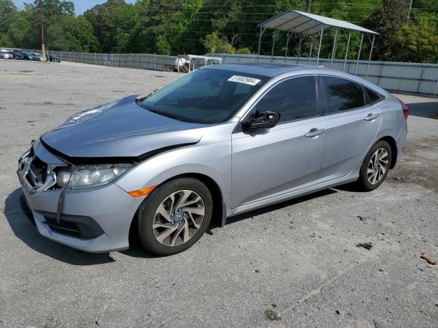 HONDA CIVIC EX 2018 with VIN 19XFC2F73JE007969 - Photo from auction