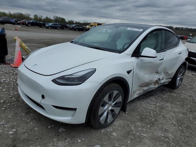 TESLA MODEL Y 2023 with VIN 7SAYGDEE6PF672895 - Photo from auction