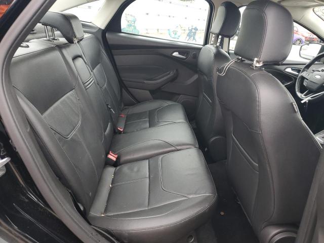Photo 10 from auction – 2016 FORD FOCUS TITA with VIN 1FADP3J25GL274940