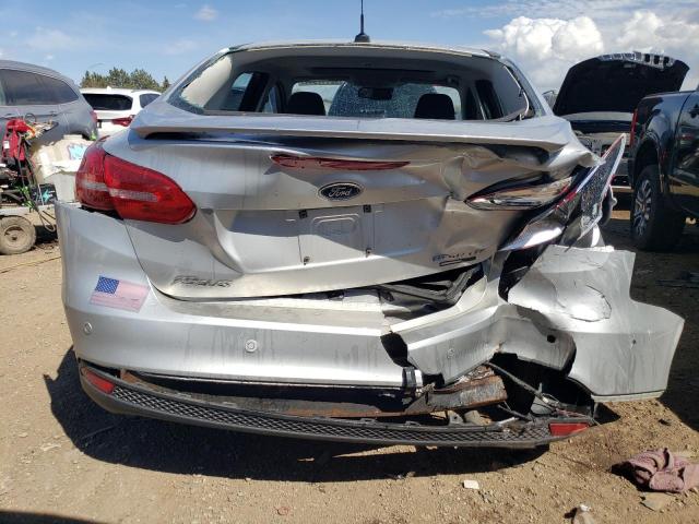 Photo 6 from auction – 2015 FORD FOCUS TITA with VIN 1FADP3J25FL253472