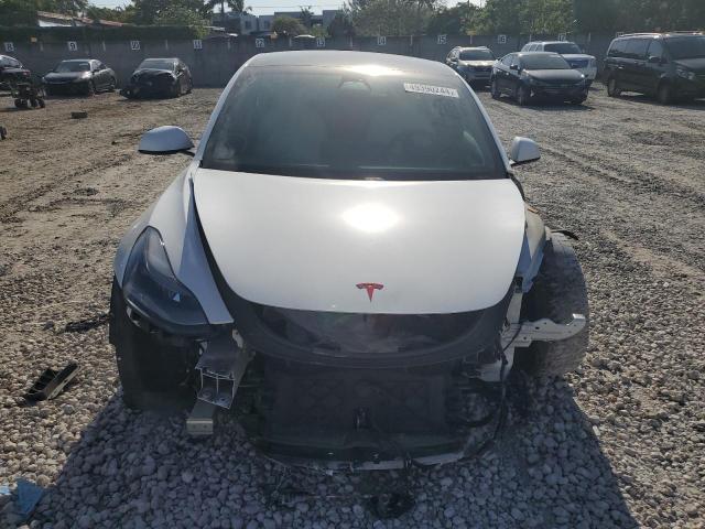 Photo 5 from auction – 2021 TESLA MODEL 3 with VIN 5YJ3E1EB1MF981428