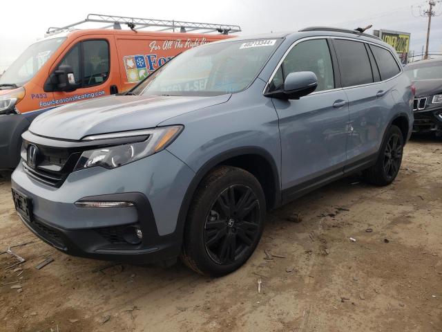 HONDA PILOT SE 2022 with VIN 5FNYF6H22NB097673 - Photo from auction