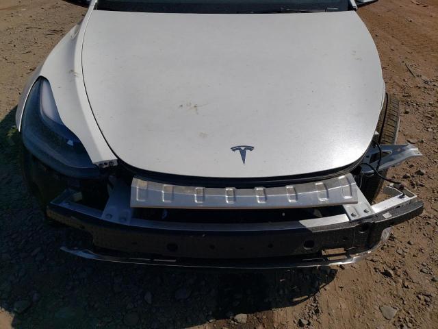 Photo 11 from auction – 2024 TESLA MODEL Y with VIN 7SAYGDEE4RA259812