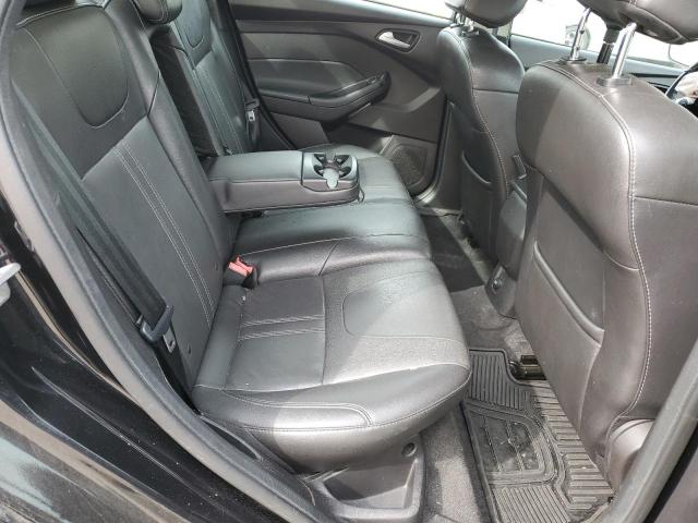 Foto 10 de la subasta – 2014 FORD FOCUS SE con VIN 1FADP3F27EL142557