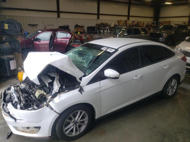 FORD FOCUS SE 2015 with VIN 1FADP3F22FL233611 - Photo from auction
