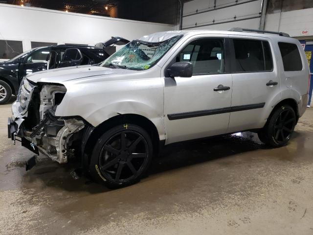 HONDA PILOT LX 2011 with VIN 5FNYF4H22BB021421 - Photo from auction