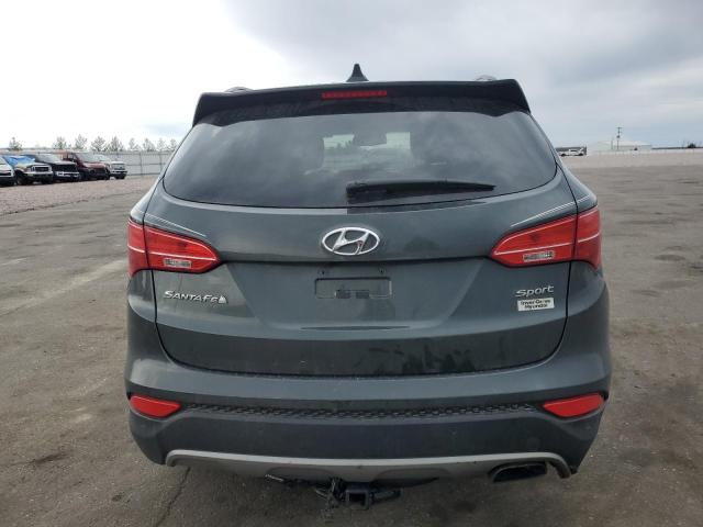 Photo 6 from auction – 2014 HYUNDAI SANTA FE S with VIN 5XYZU3LB2EG192579