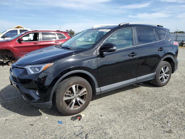 TOYOTA RAV4 XLE 2016 with VIN 2T3RFREV4GW428898 - Photo from auction