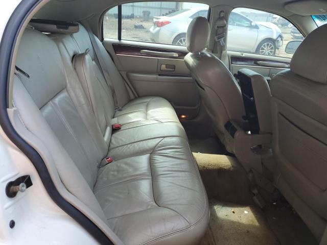 Photo 10 from auction – 2004 LINCOLN TOWN CAR U with VIN 1LNHM83W04Y678224