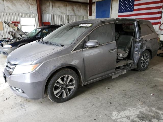 Photo 1 from auction – 2014 HONDA ODYSSEY TO with VIN 5FNRL5H94EB021229