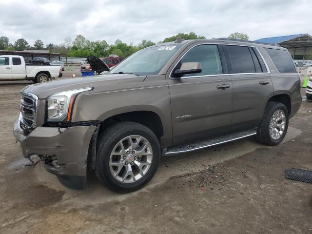 GMC YUKON SLT 2016 with VIN 1GKS1BKC3GR411010 - Photo from auction