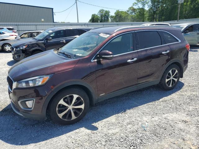 KIA SORENTO EX 2016 with VIN 5XYPHDA10GG008979 - Photo from auction