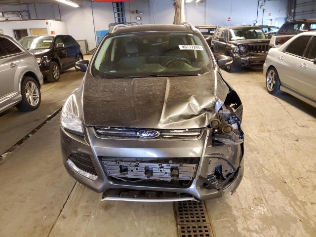Photo 5 from auction – 2016 FORD ESCAPE TIT with VIN 1FMCU9J98GUA26993