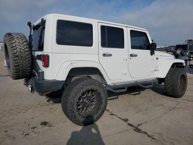 Photo 3 from auction – 2011 JEEP WRANGLER U with VIN 1J4HA5H12BL615736