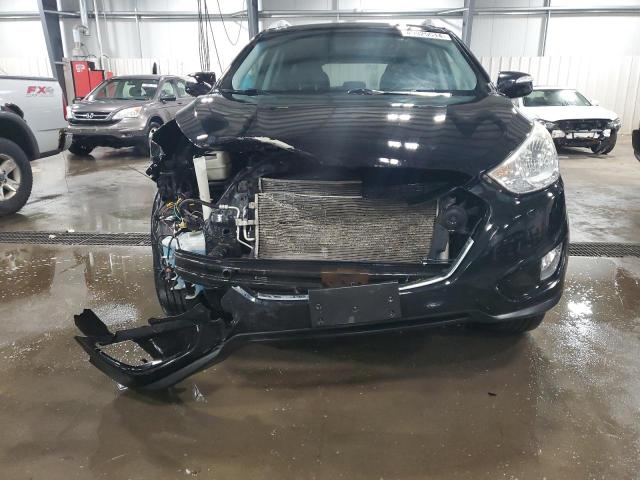 Photo 5 from auction – 2011 HYUNDAI TUCSON GLS with VIN KM8JUCAC5BU172132