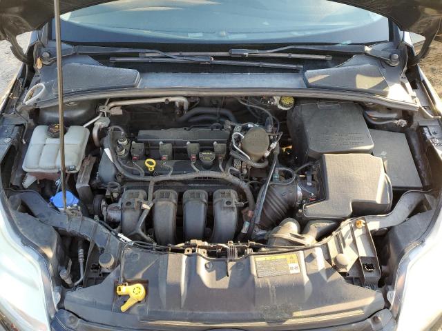 Photo 11 from auction – 2013 FORD FOCUS SE with VIN 1FADP3F25DL115646