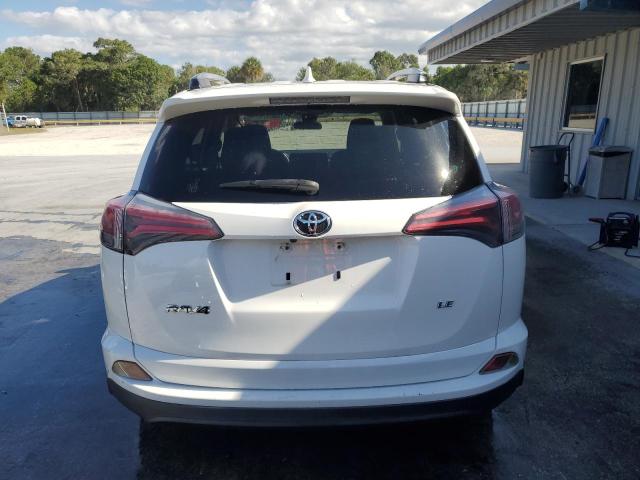 Photo 6 from auction – 2017 TOYOTA RAV4 LE with VIN JTMZFREV0HJ706132