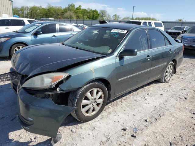 TOYOTA CAMRY LE 2002 with VIN 4T1BF30K92U511403 - Photo from auction