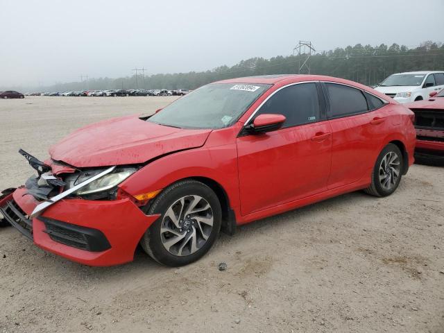 HONDA CIVIC EX 2018 with VIN 2HGFC2F74JH556943 - Photo from auction