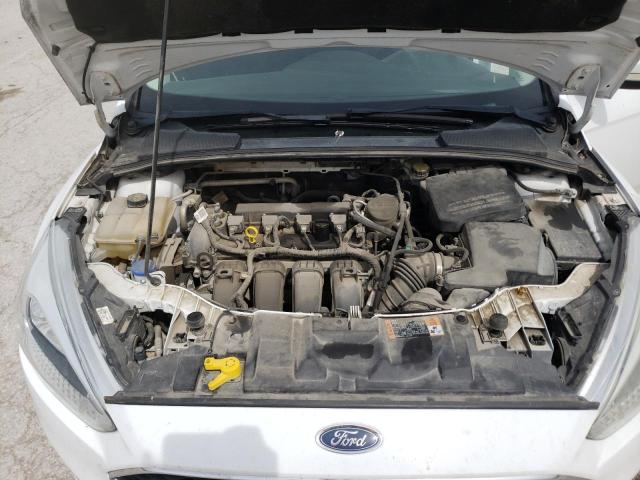 Photo 11 from auction – 2015 FORD FOCUS SE with VIN 1FADP3F29FL242855